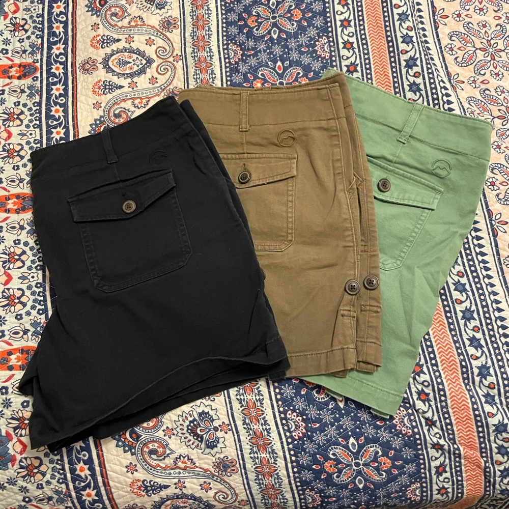 Set of (3) Magellan adjustable length shorts: black, brown, green
